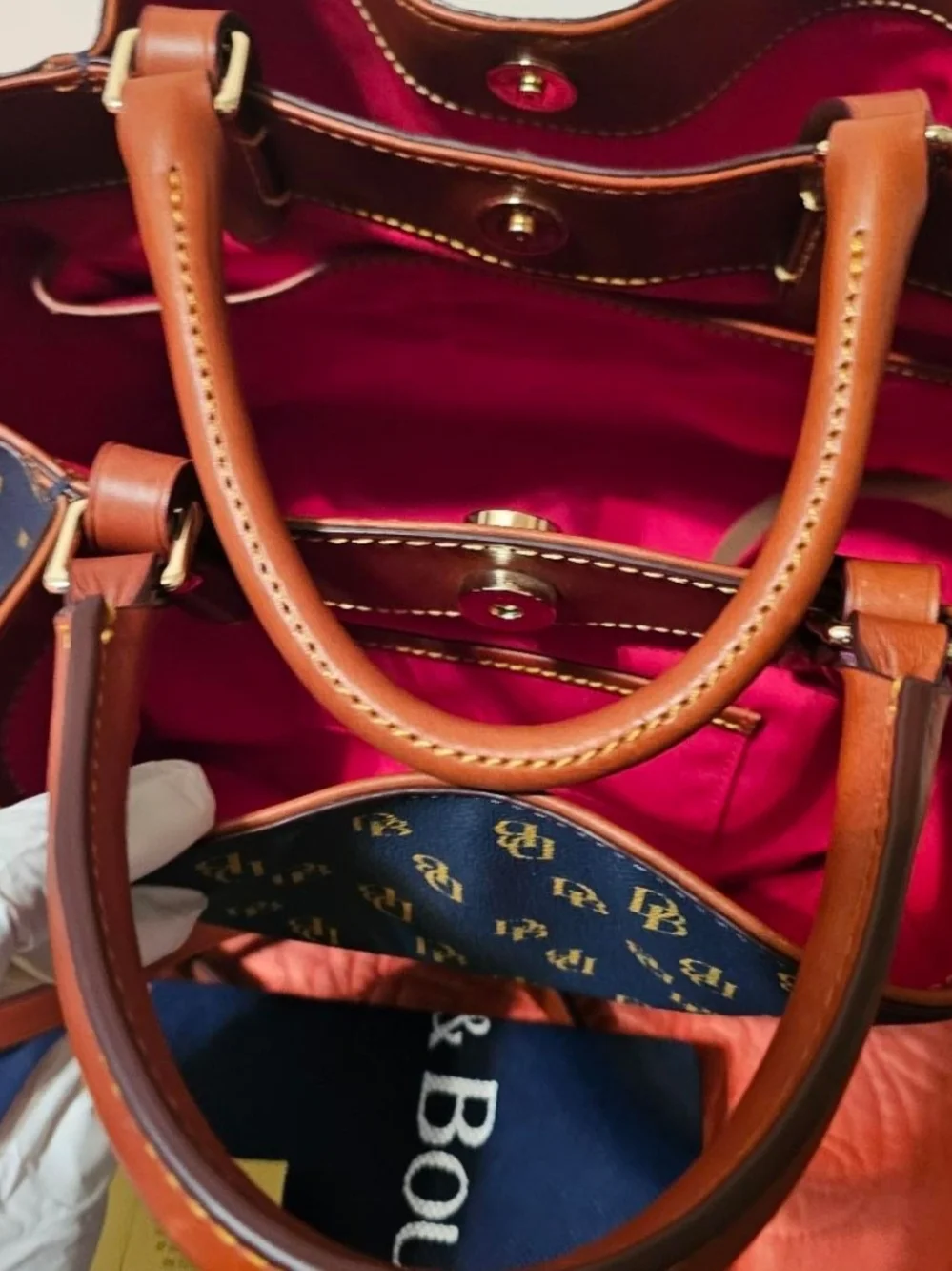 Pre-owned. Price Is Firm -Dooney & Bourke Navy and Gold Signature Tote